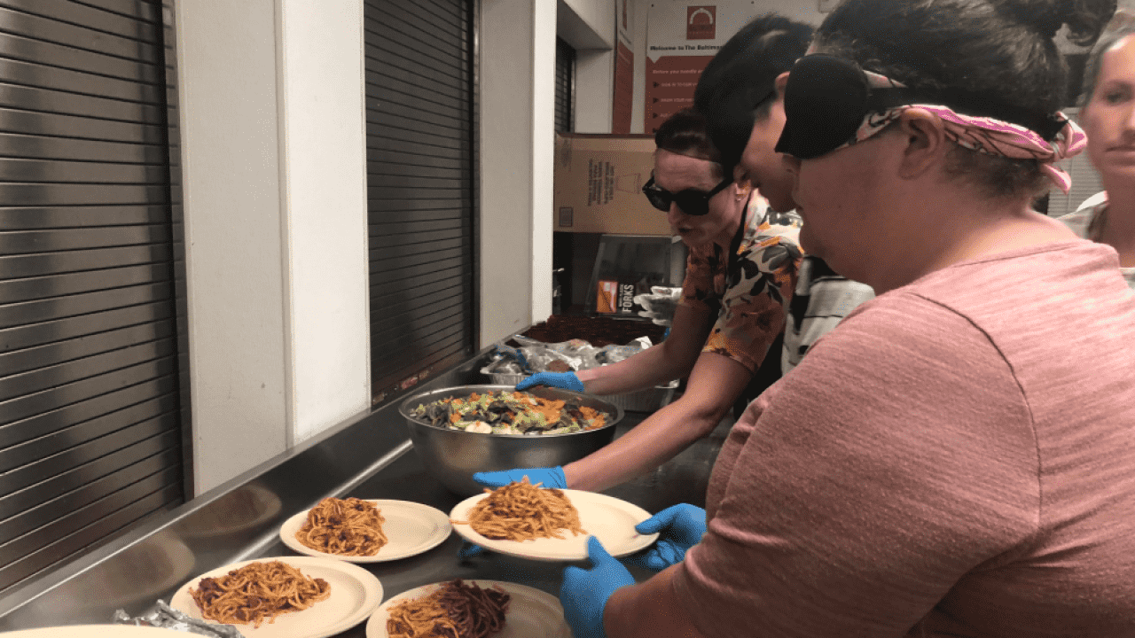 Students from Blind Services and Industries of Maryland prepare dinner for veterans