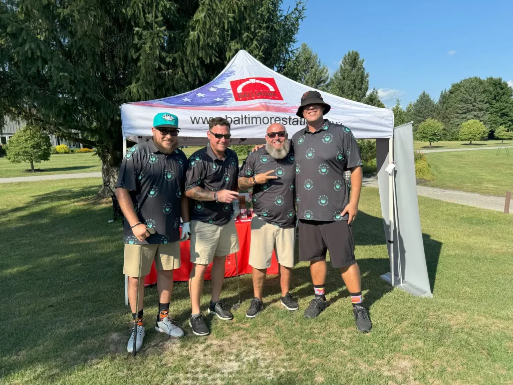 Community supporters hosting a golf tournament for The Baltimore Station
