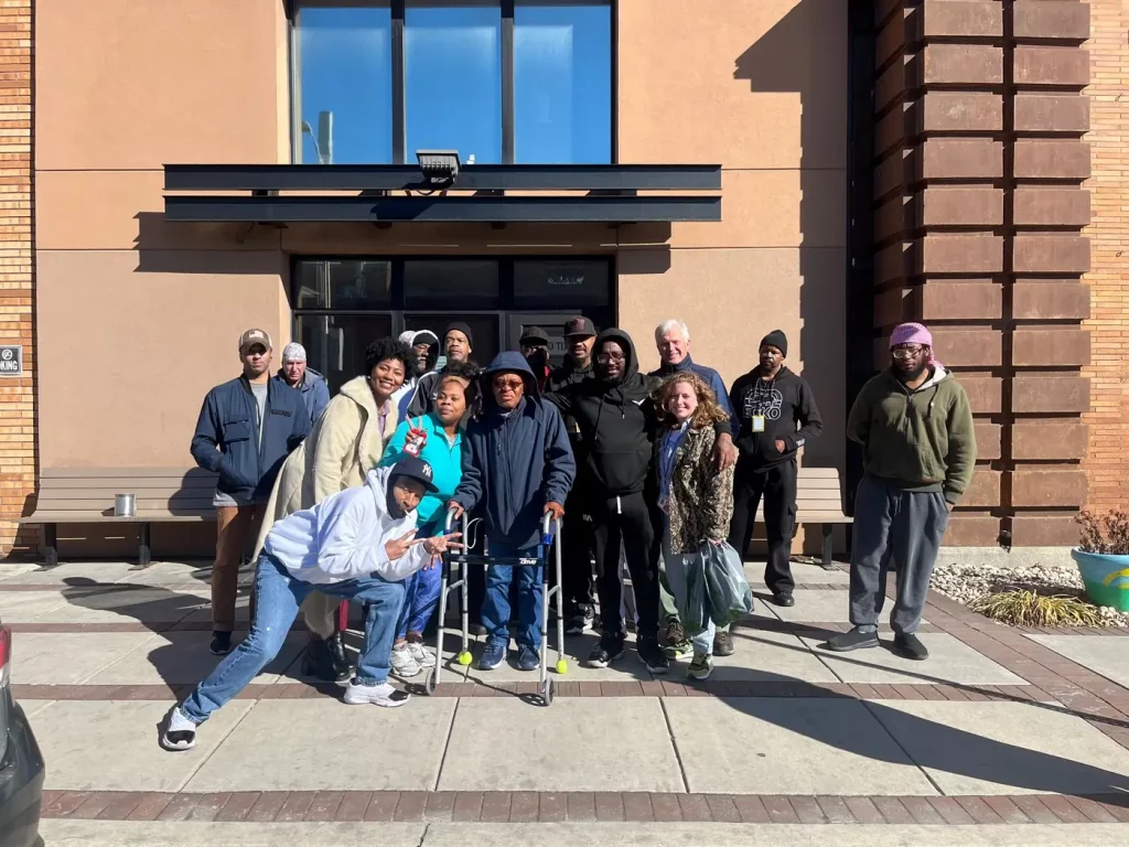 Residents and staff gathered outside The Baltimore Station