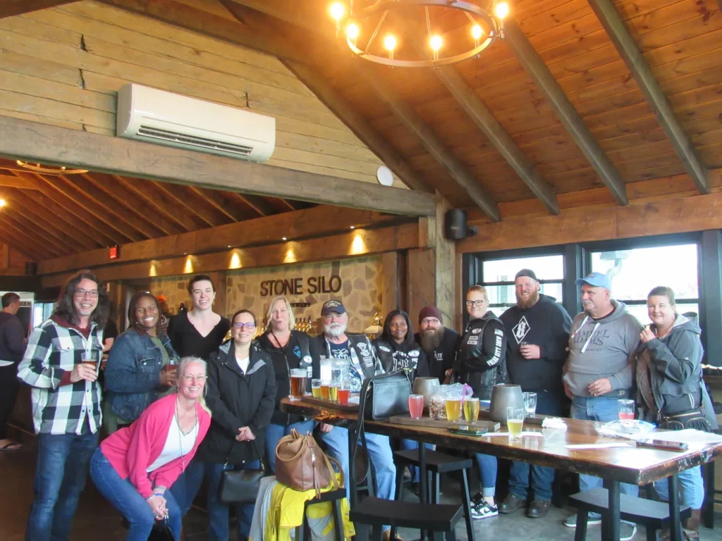 Riders gathered at a Poker Run stop benefiting The Baltimore Station