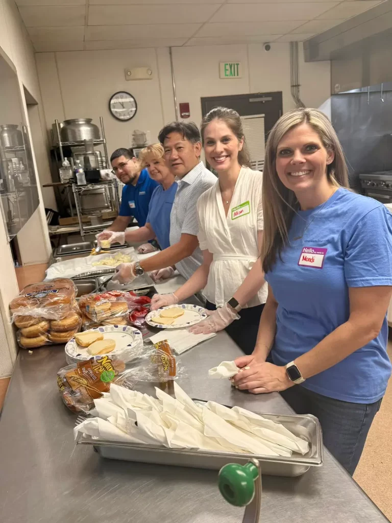 OneMain Financial volunteers serving a meal